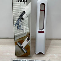 Mini mop cleaning a counter surface, demonstrating ease of use